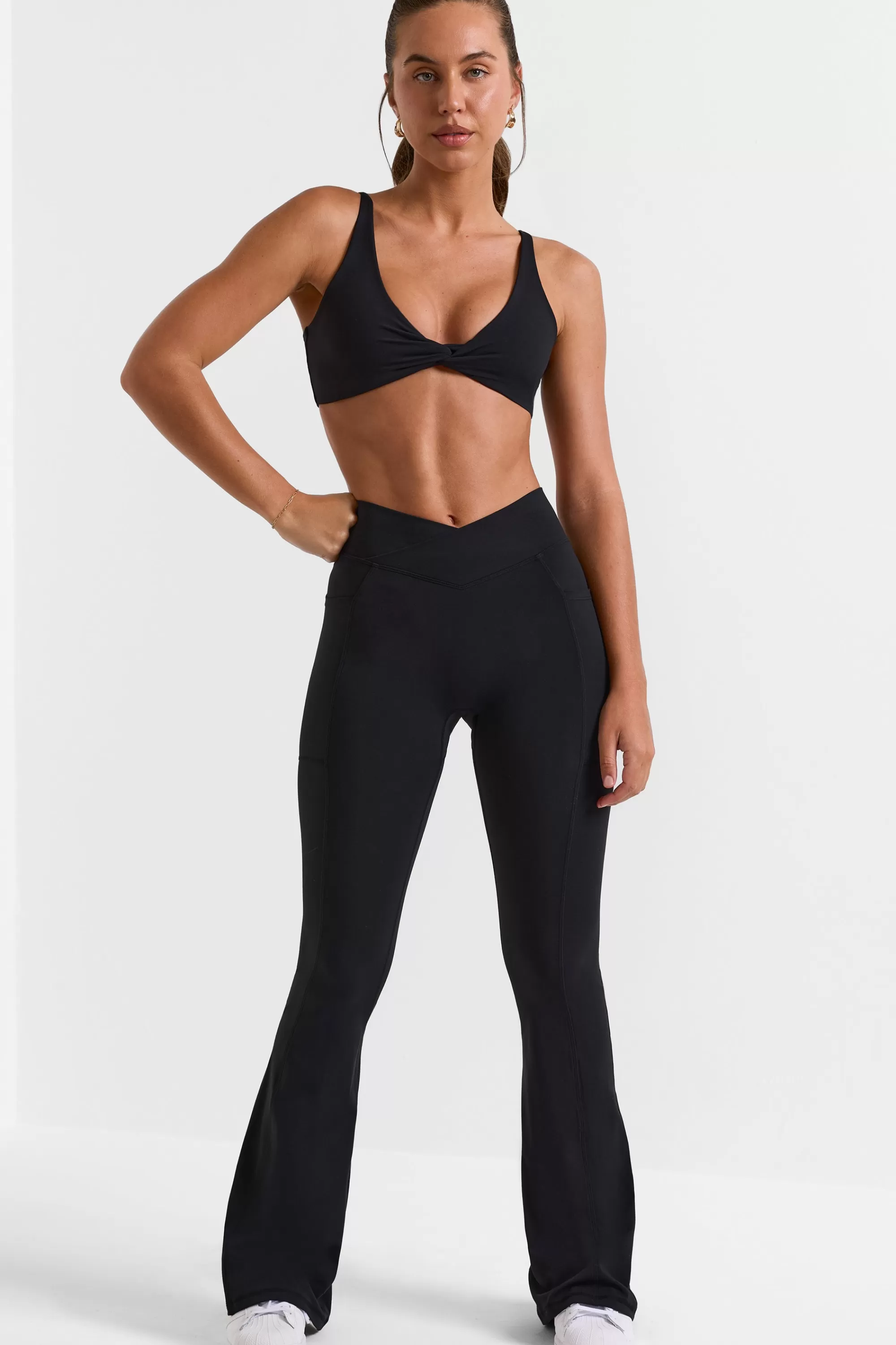 Oh Polly Cross Waistband Flare Pocket Leggings In Black Online