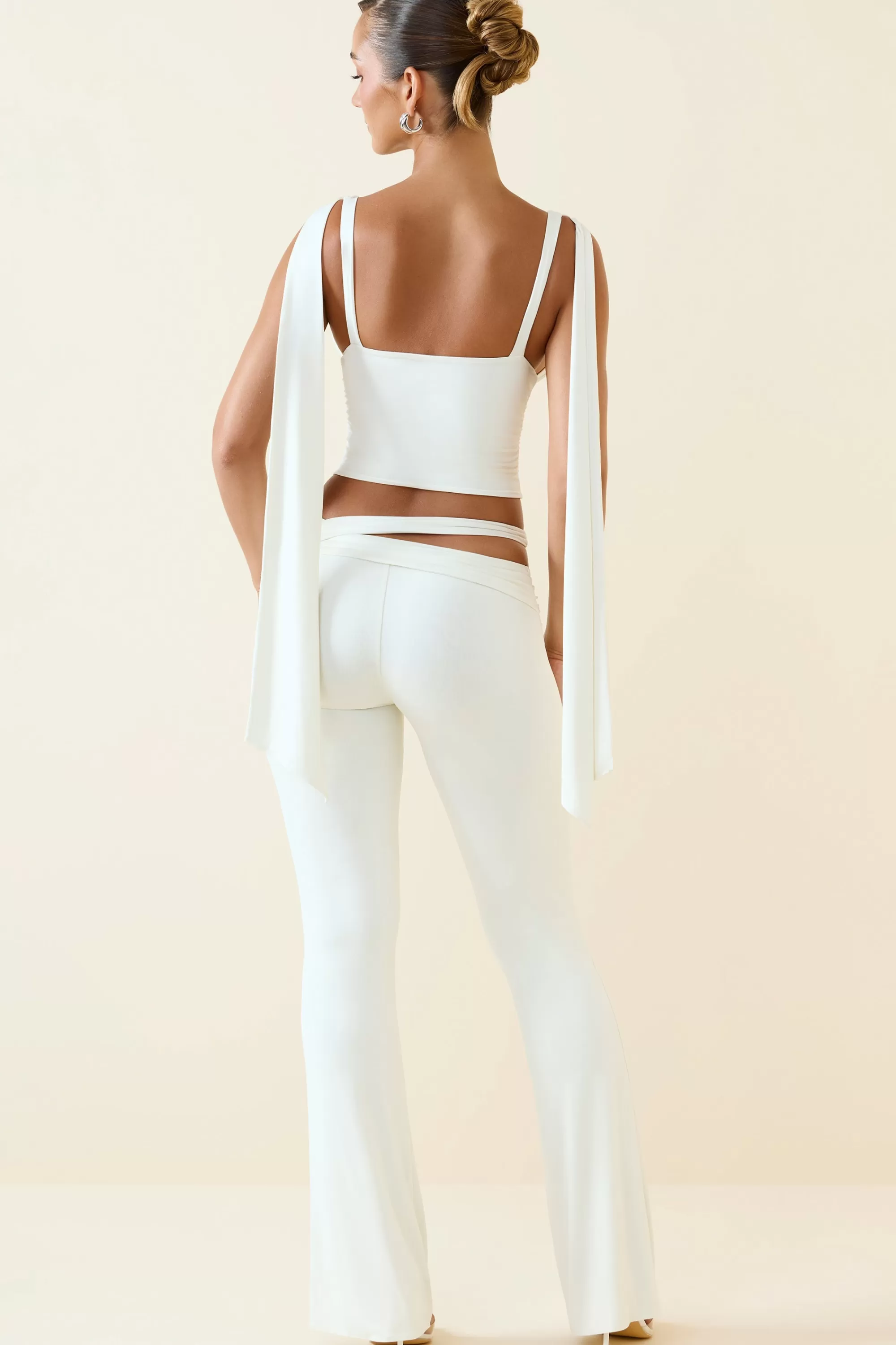 Oh Polly Cut-Out Mid-Rise Flared Trousers In Vanilla Online