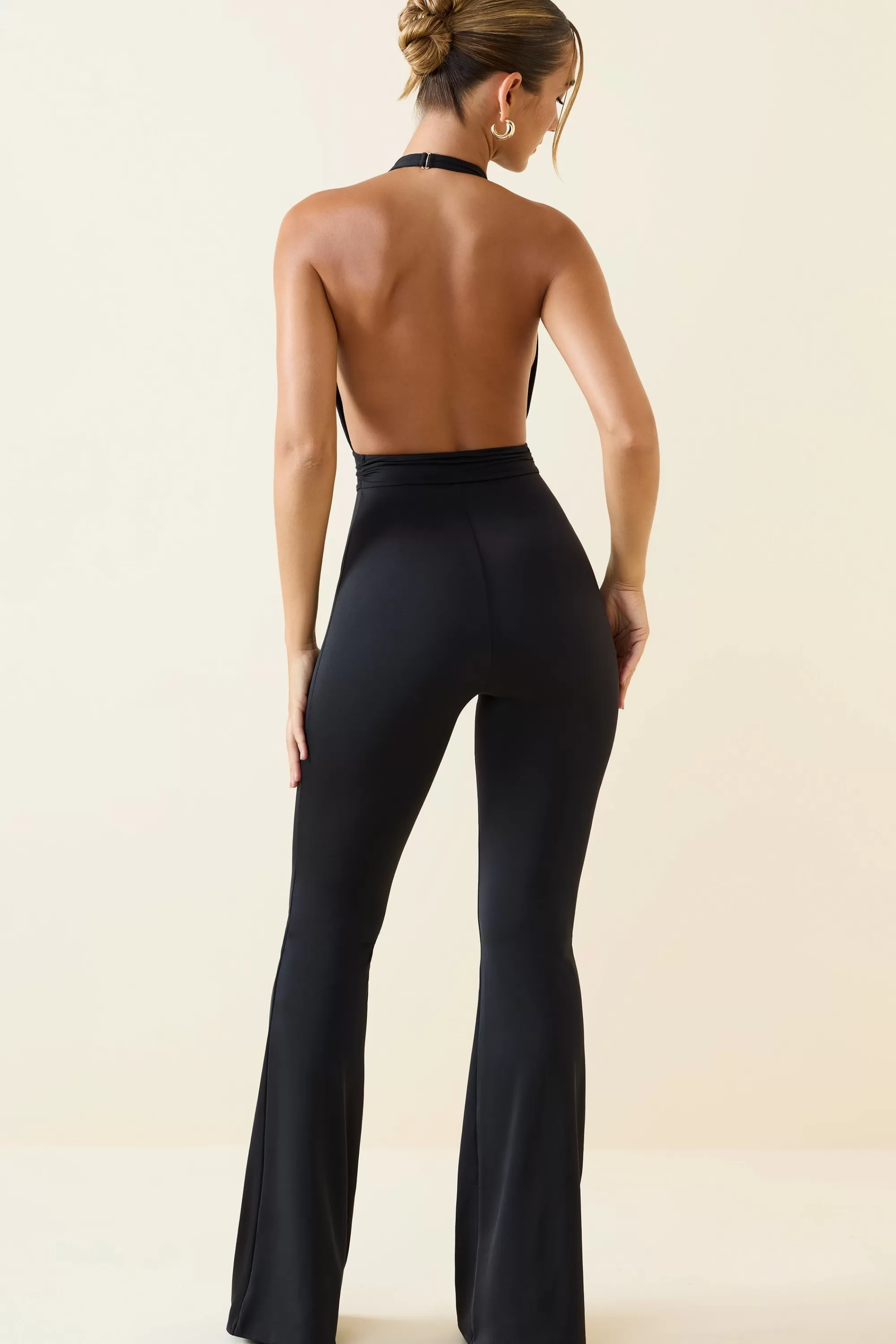 Oh Polly Halterneck Cut-Out Flared Jumpsuit In Black Best Sale