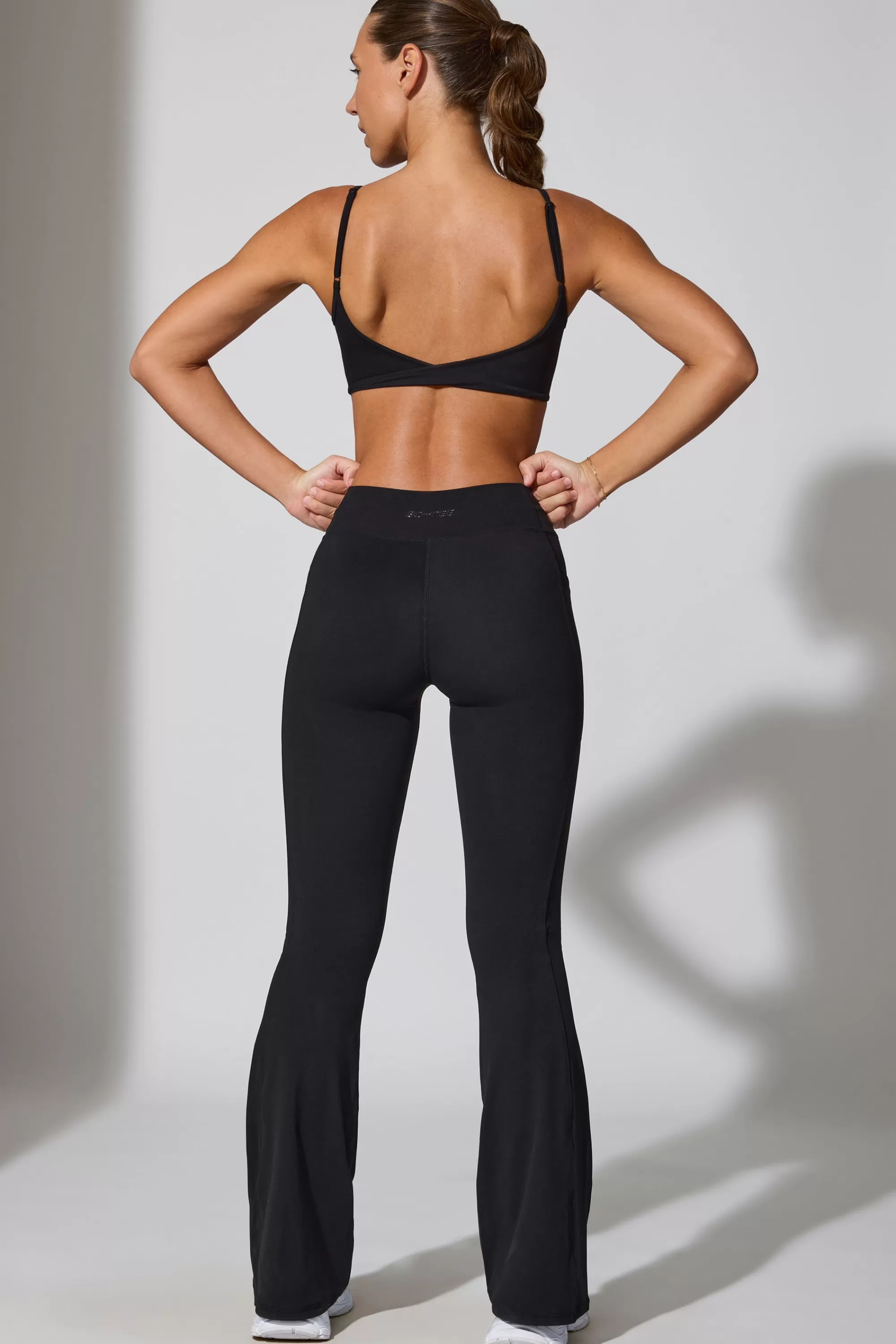 Oh Polly Petite Twist Waist Flare Leggings In Black Best Sale