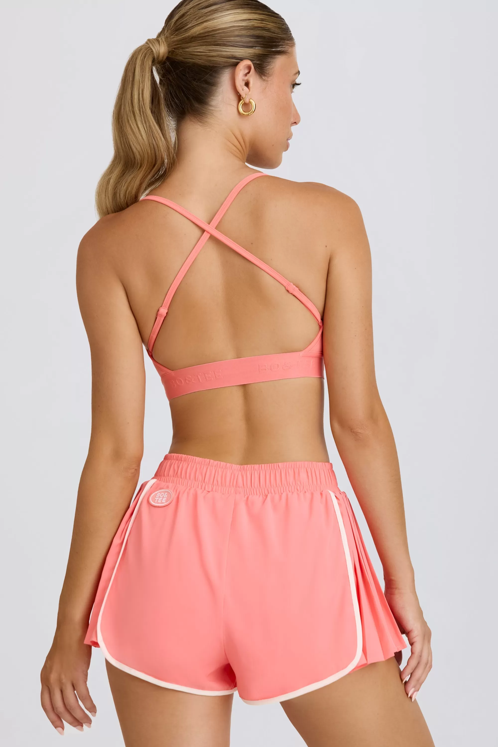 Oh Polly Pleated Mini Shorts In Coral Hot