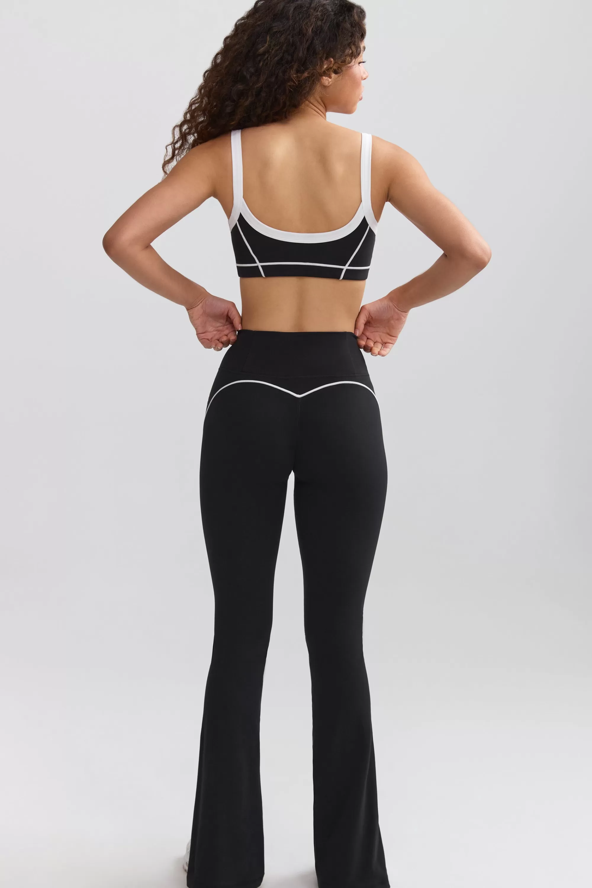 Oh Polly Soft Active Contrast-Trim Flared Trousers In Black Best Sale