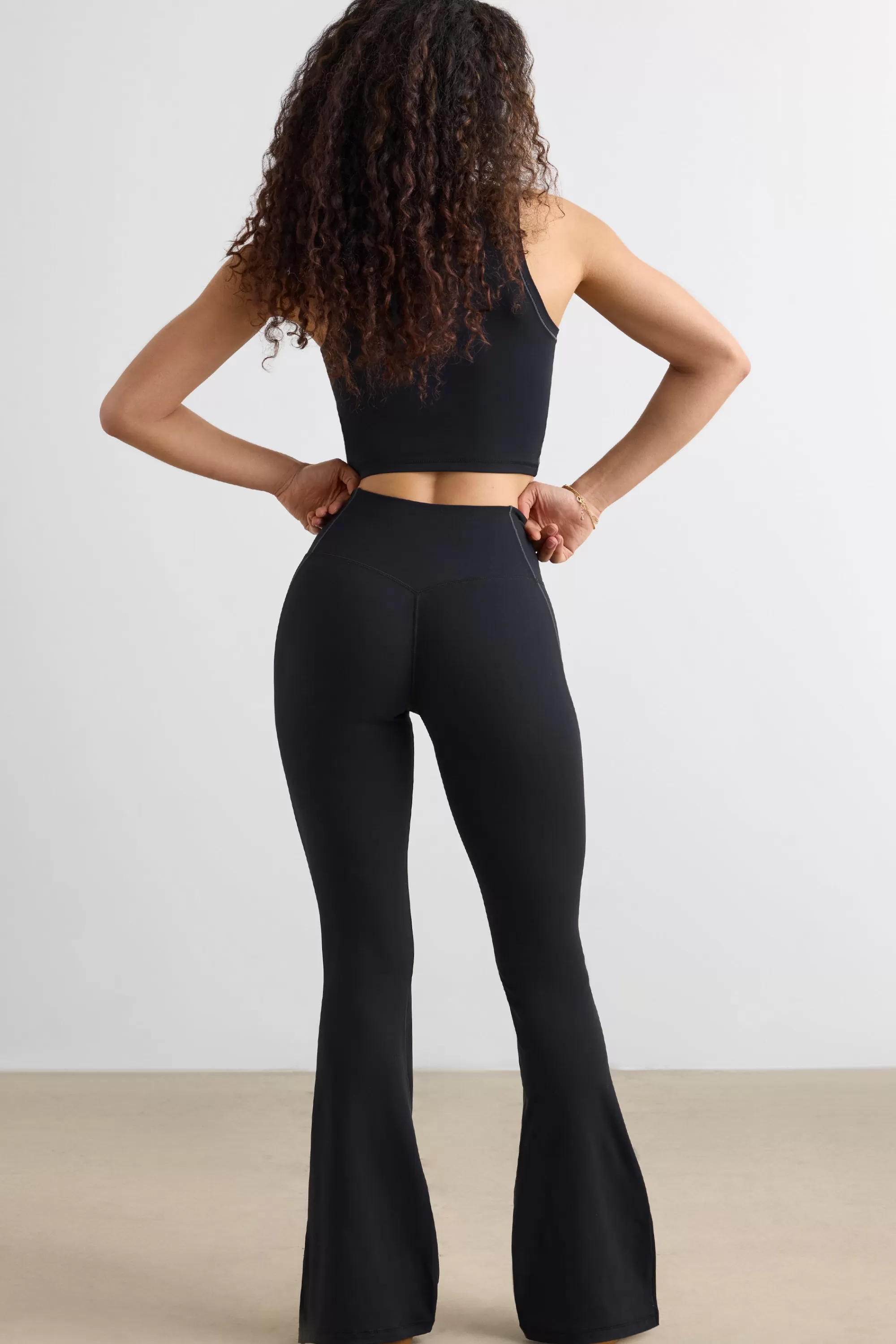 Oh Polly Soft Active Flared Trousers In Black Flash Sale