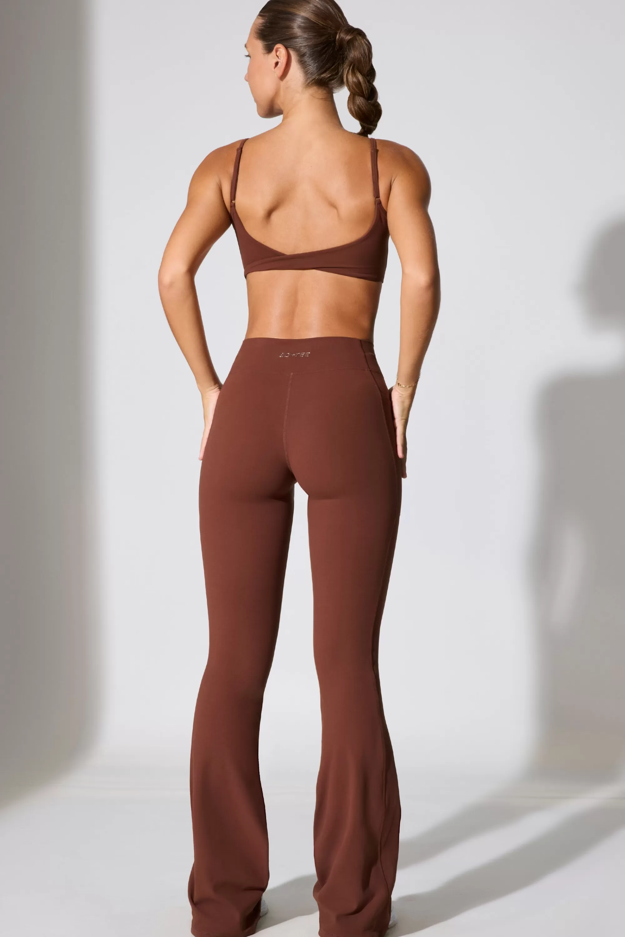 Oh Polly Twist Waist Flare Leggings In Chocolate Best Sale